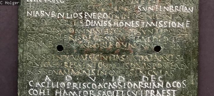 Syrian bronze diploma with ancient writing engraved on the surface 