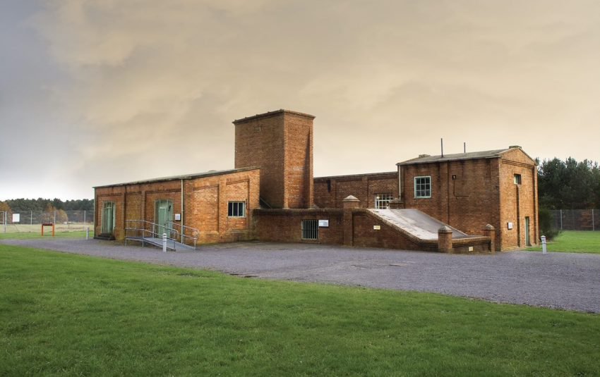 An exterior view of the Walker Fan House at Woodhorn Museum. It is a large red brick building
