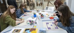 Four people are crafting at the Hatton Gallery