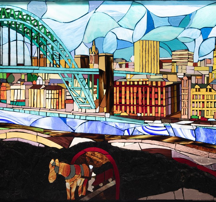 Glass painting of the Tyne Bridge and mining past