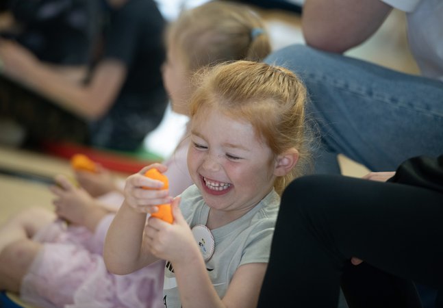 little girl laughs 
