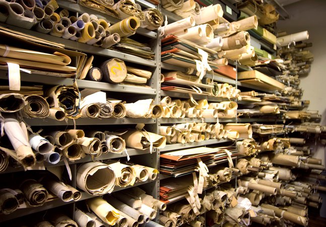 shelves full of large scrolls 