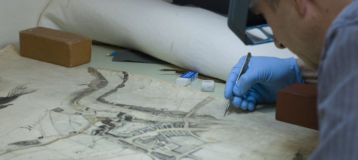 Conservation work on an old map