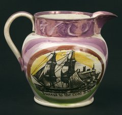 Decorative jug with sailing ship and inscription 'success to the Coal Trade'.