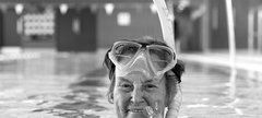 Woman in swimming pool wearing a snorkel