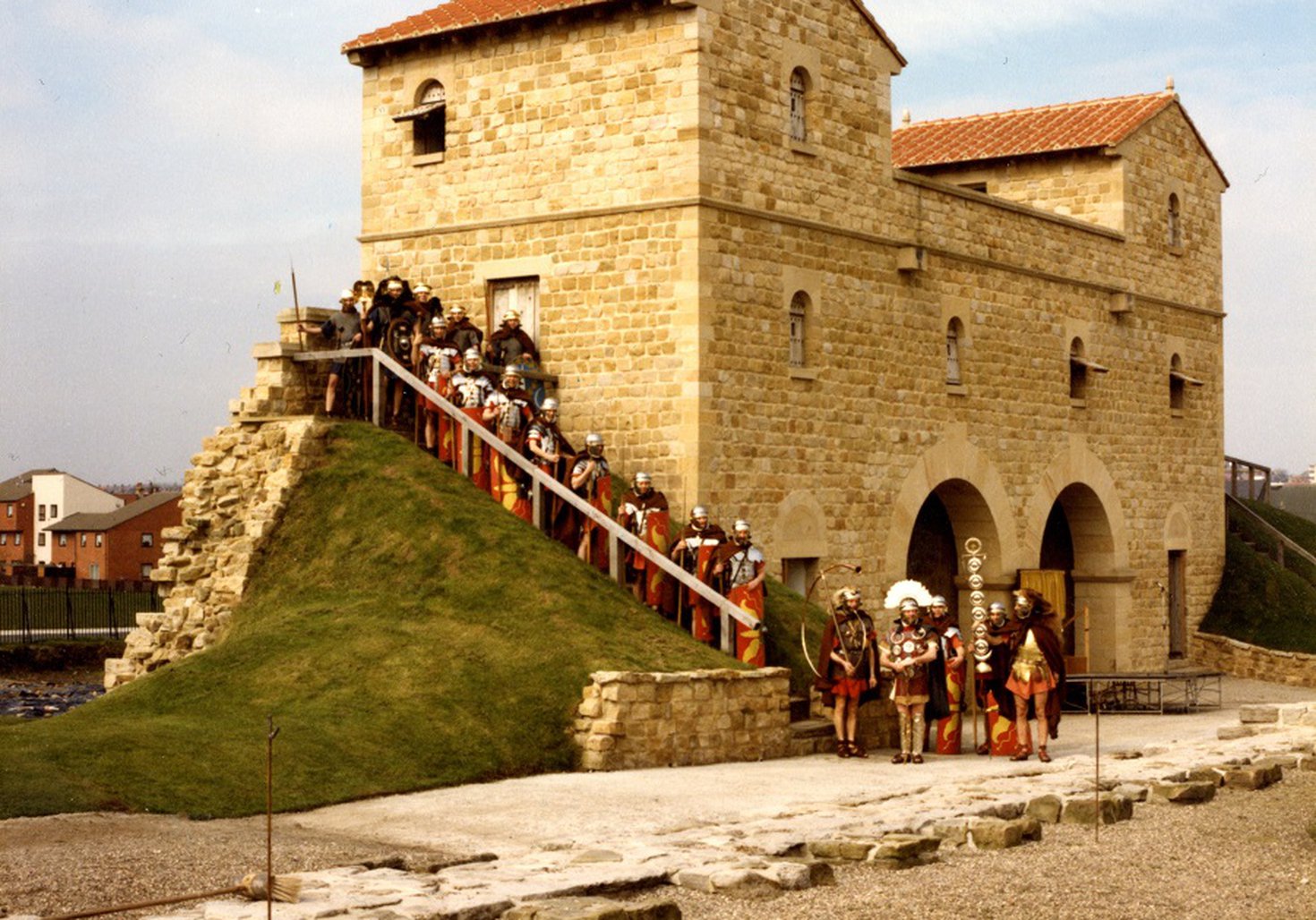 A group dressed as Roman Soldiers guard the West Gate at Arbeia Roman Fort