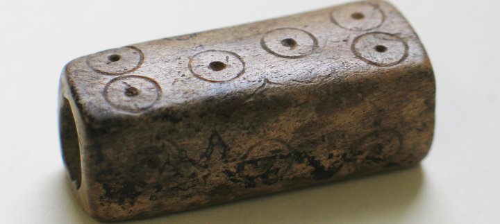 A long four sided dice