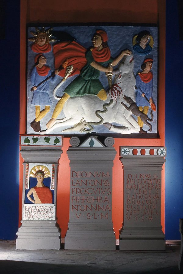 A reconstruction of Mithraic stonework from Carrawburgh giving an impression of how the original Roman paintwork might have looked. The altar of Marcus Simplicius Simplex is on the left