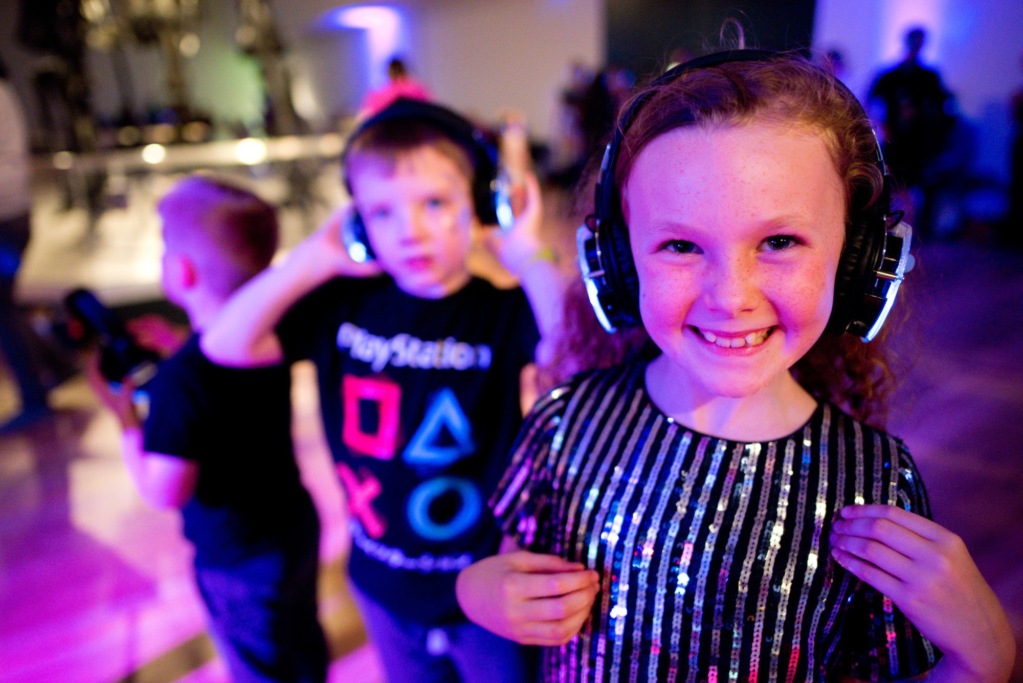 Children enjoy a 'Silent Disco' wearing headphones at the Great North Museum