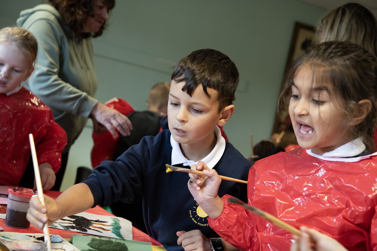 Children painting at a museum. Children painting at a museum.