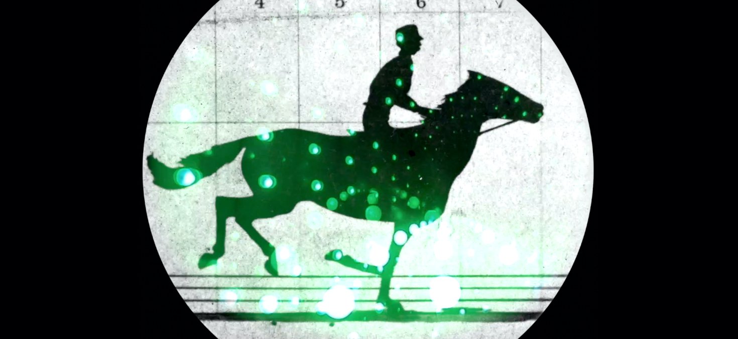 A silhouette of a person riding a horse