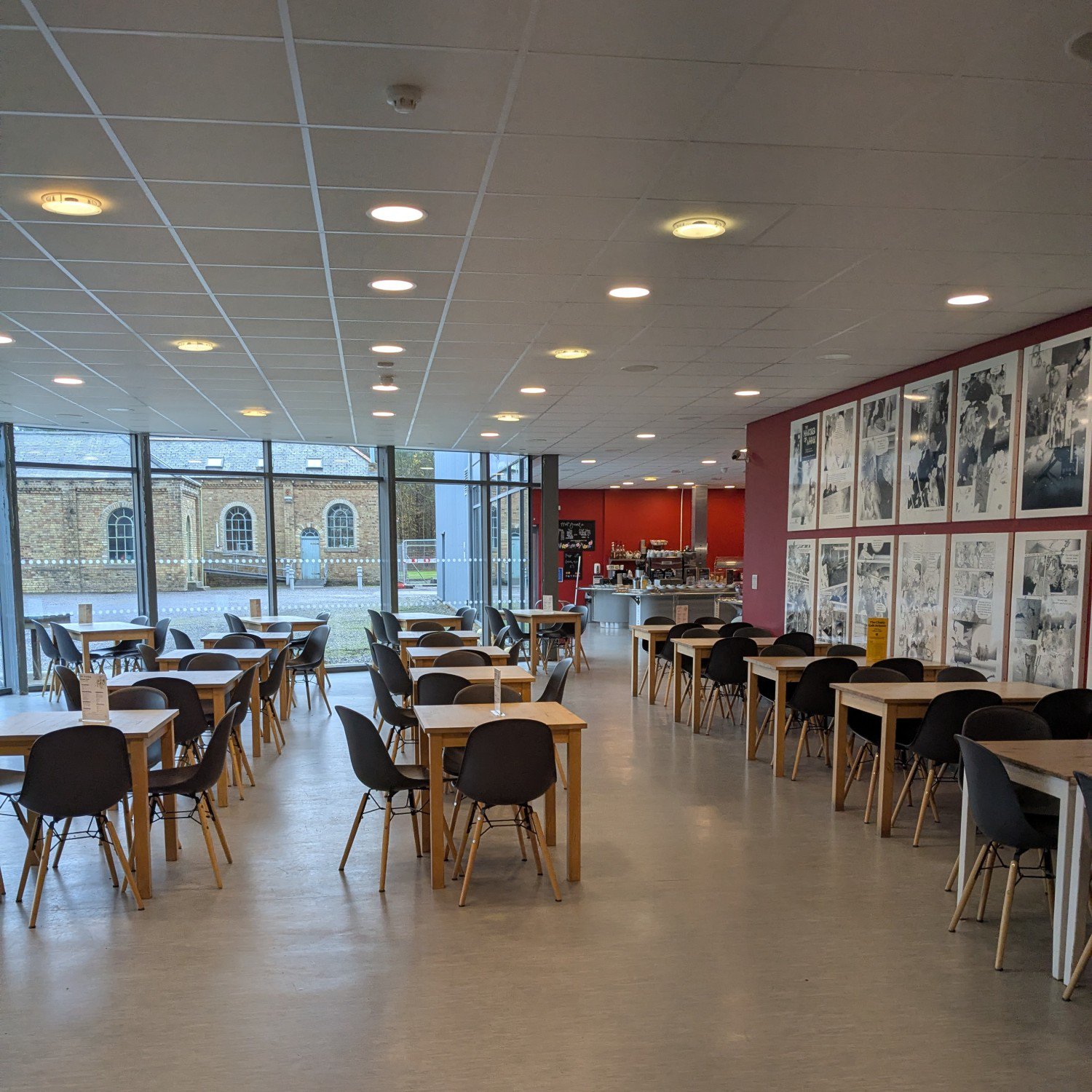 Lots of tables and chairs in Woodhorn Museum's café.