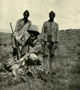 An undated photograph of Abel Chapman hunting Hyena in British East Africa with two game trackers; Elmi Hasan and an unknown man.