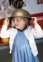 Small girl in old helmet 