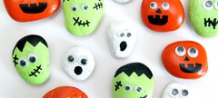 Halloween Rock Craft: Image of painted halloween-inspired faces on rocks