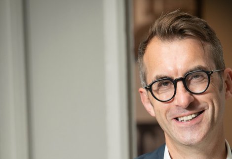 Portrait photograph of Keith Merrin