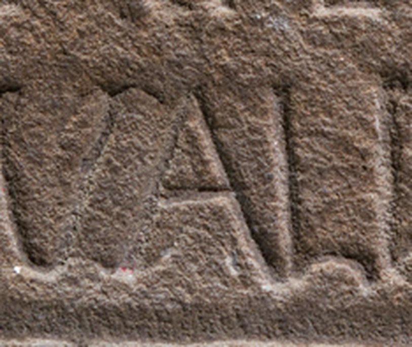 Regina tombstone spelling detail