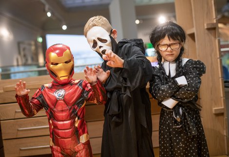 Children in Halloween fancy dress at a museum