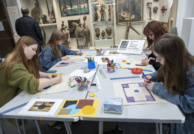 Four people are crafting at the Hatton Gallery