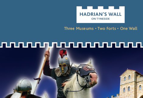 Roman soldier on horse attacking Roman foot soldier with stone gated building behind