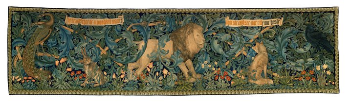 A tapestry that depicts a lion, peacock, hare, and fox.