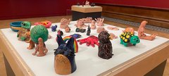 photo of clay objects that people have made