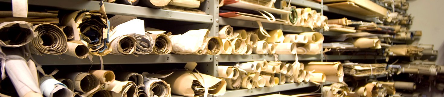 shelves full of large scrolls 