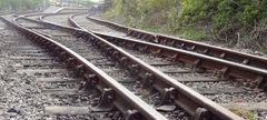 Railway tracks stretching towards the platform