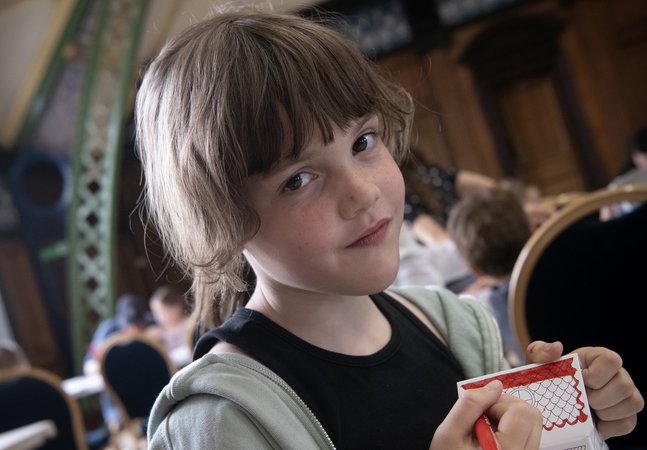 girl does crafts at museum