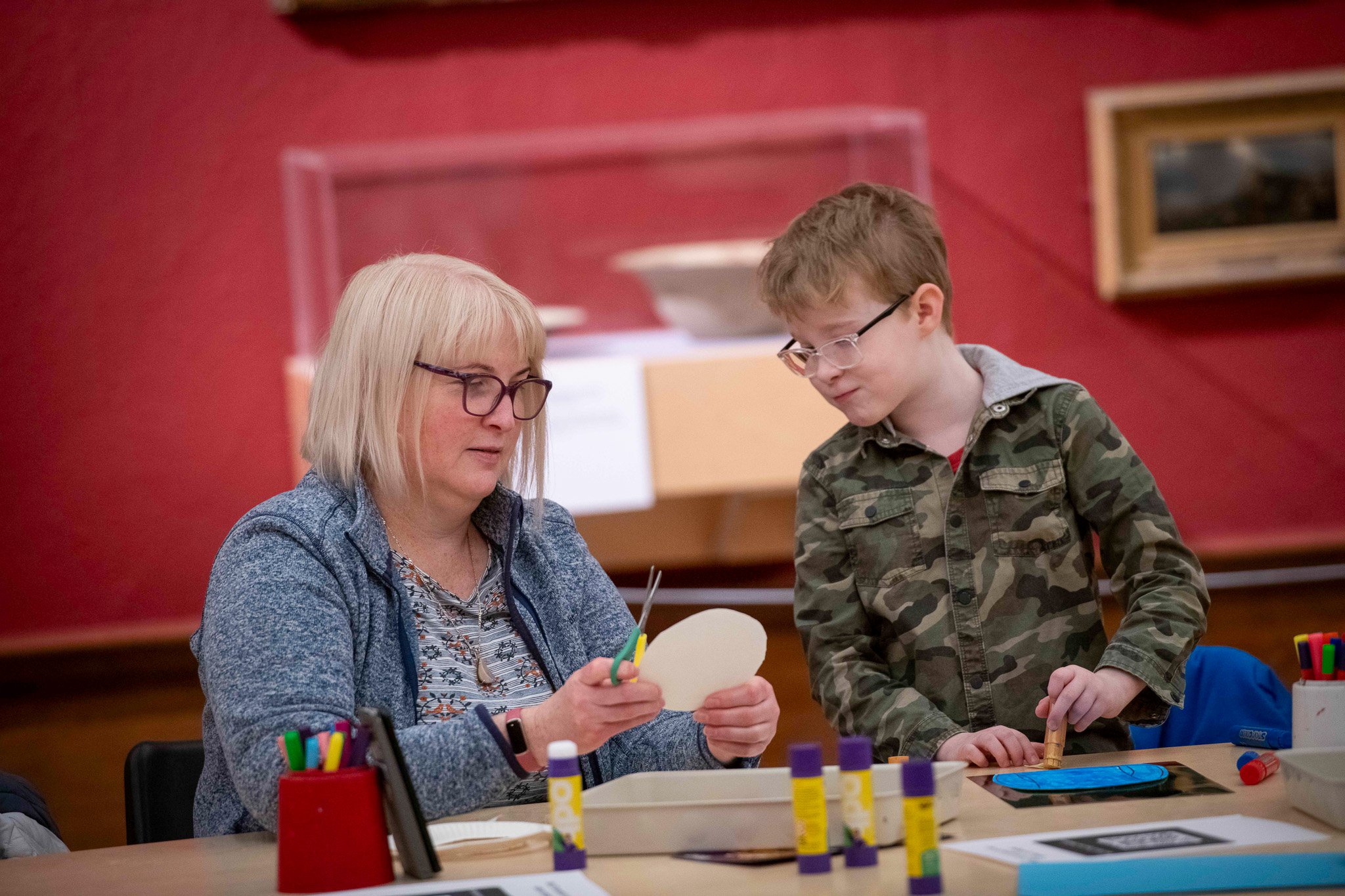 Woman and child doing a craft activity at Shipley Art Gallery.