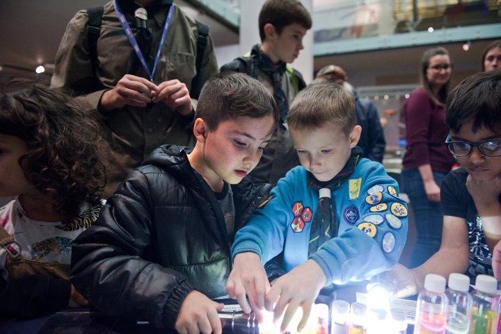 Young children take part in a science experiment in the Great North Museum