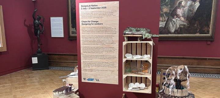 A display of artwork in a large gallery space.