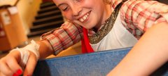 girl looking at artifacts