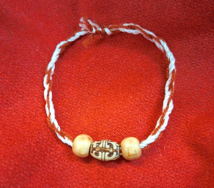 Roman style bracelet made of string and beads