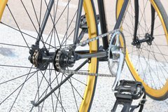 Photograph of a bicycle showing both wheels and the pedals