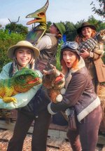 Puppeteers with dinosaurs puppets