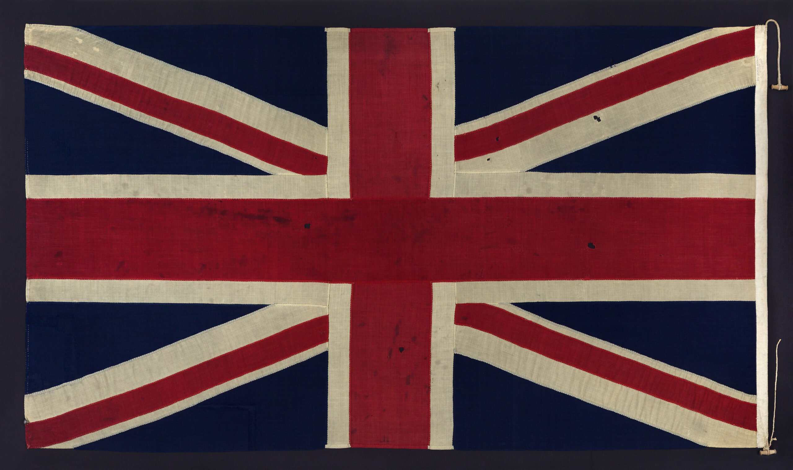 A union flag made from bunting material.