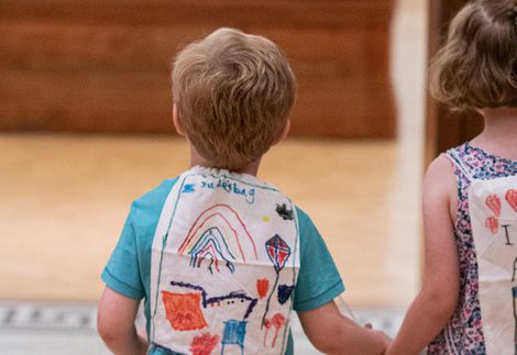Under 5s activity day: Image of two children holding hands