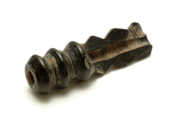 A jet bead A jet bead