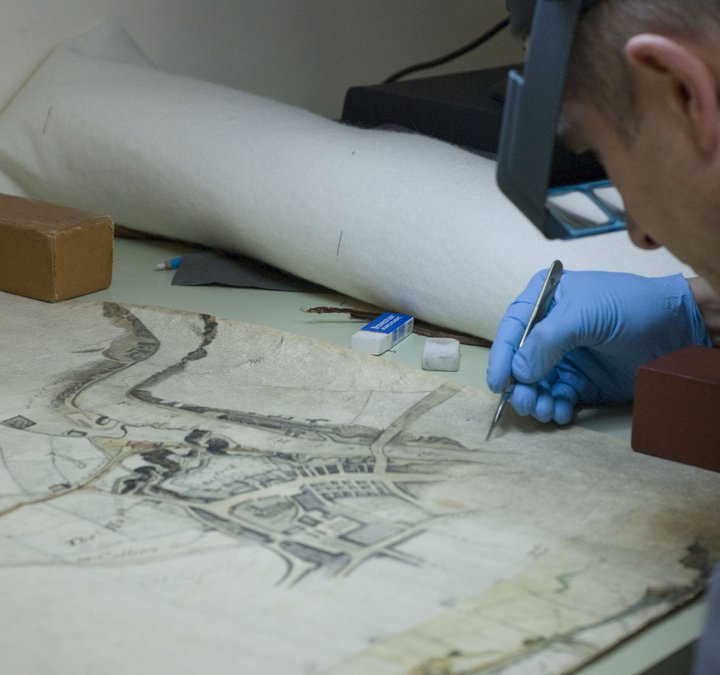 Conservation work on an old map
