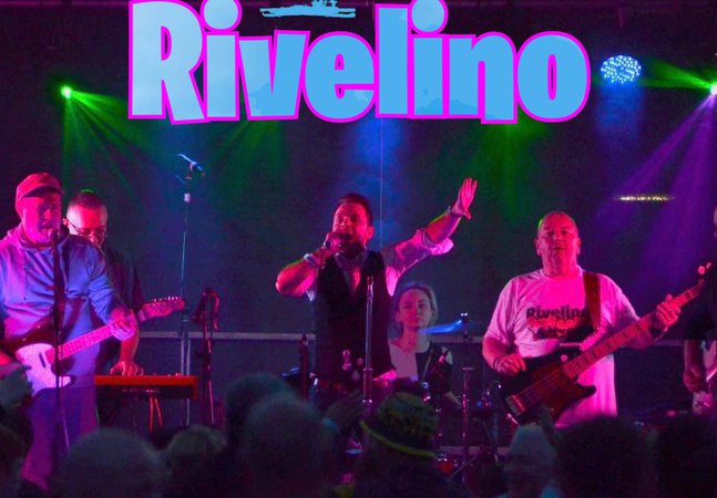 Members of a rock band in concert