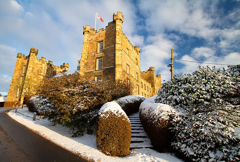 Exterior of Lumley Castle Hotel in the snow Exterior of Lumley Castle Hotel in the snow