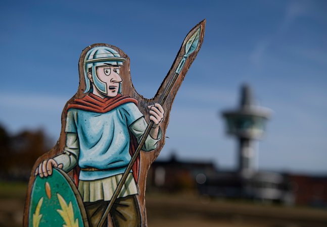 Roman trail character with viewing tower in the background