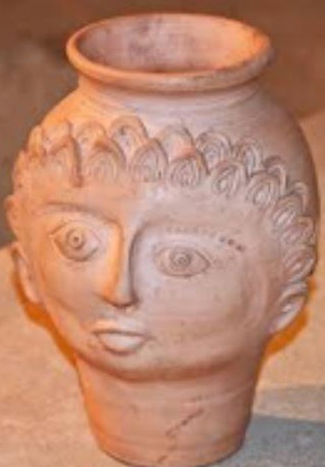 Roman head pot