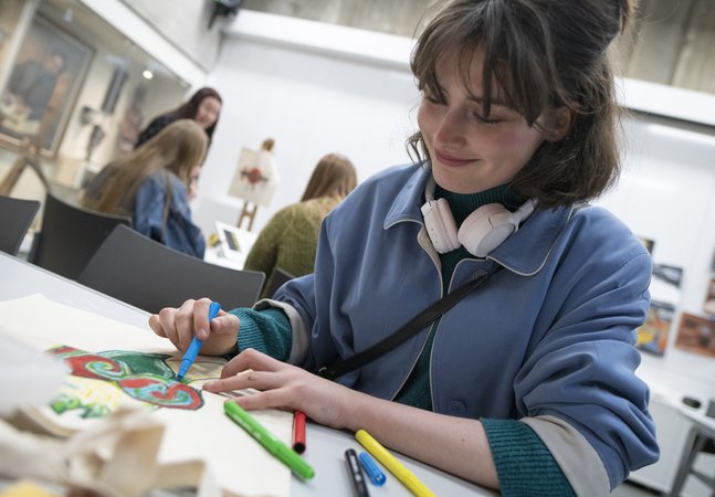 One person is crafting at the Hatton Gallery