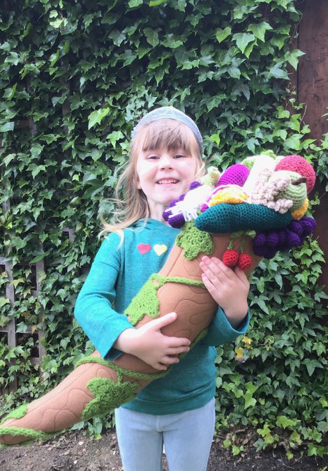 Young girl holding cornucopia