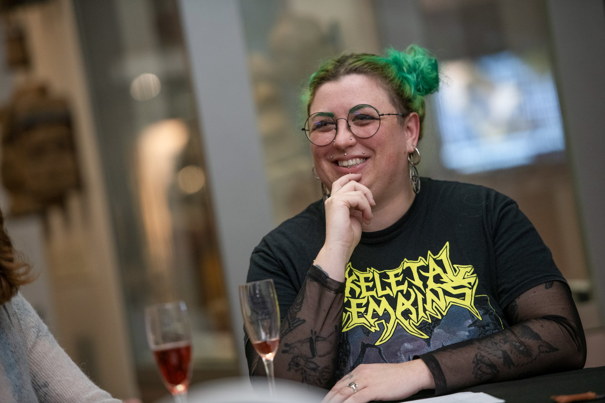 Woman at a museum late event.