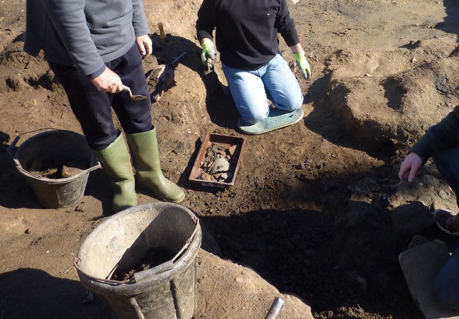 WallQuest volunteers in excavation pit at Arbeia