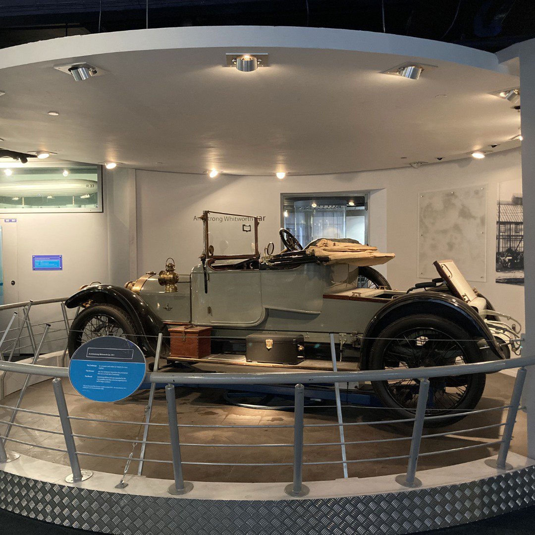Historical car exhibit in a museum Historical car exhibit in a museum