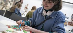 One person is crafting at the Hatton Gallery